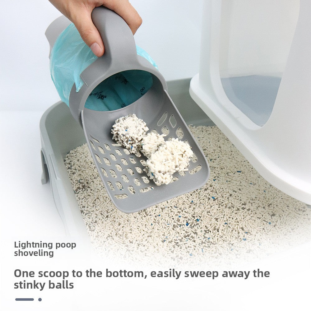Petlivo Bag Dispenser Shovel handle close-up holding biodegradable waste bag roll